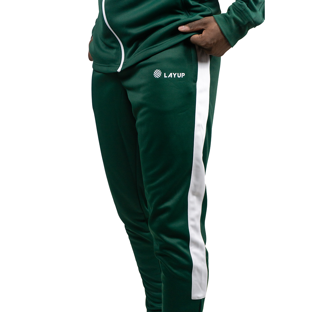 Pantalon de survêtement Layup en maille de couleur verte avec des bandes blanches sur le côté des jambes